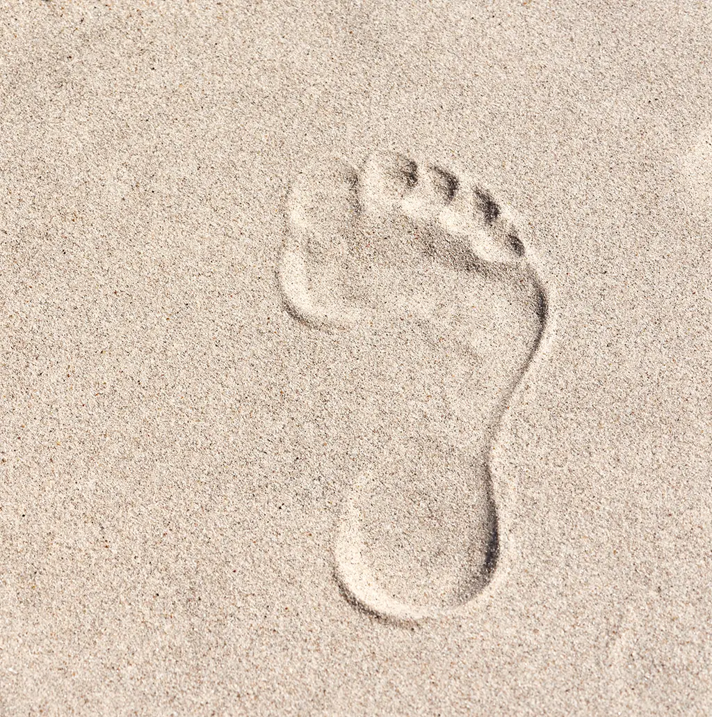 Fußabdruck im Sand